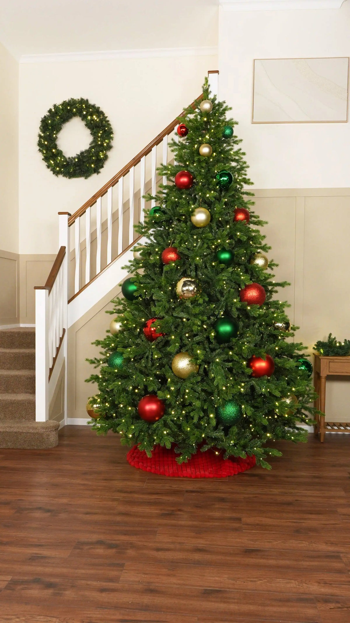 Layer Smaller Baubles Throughout the Tree