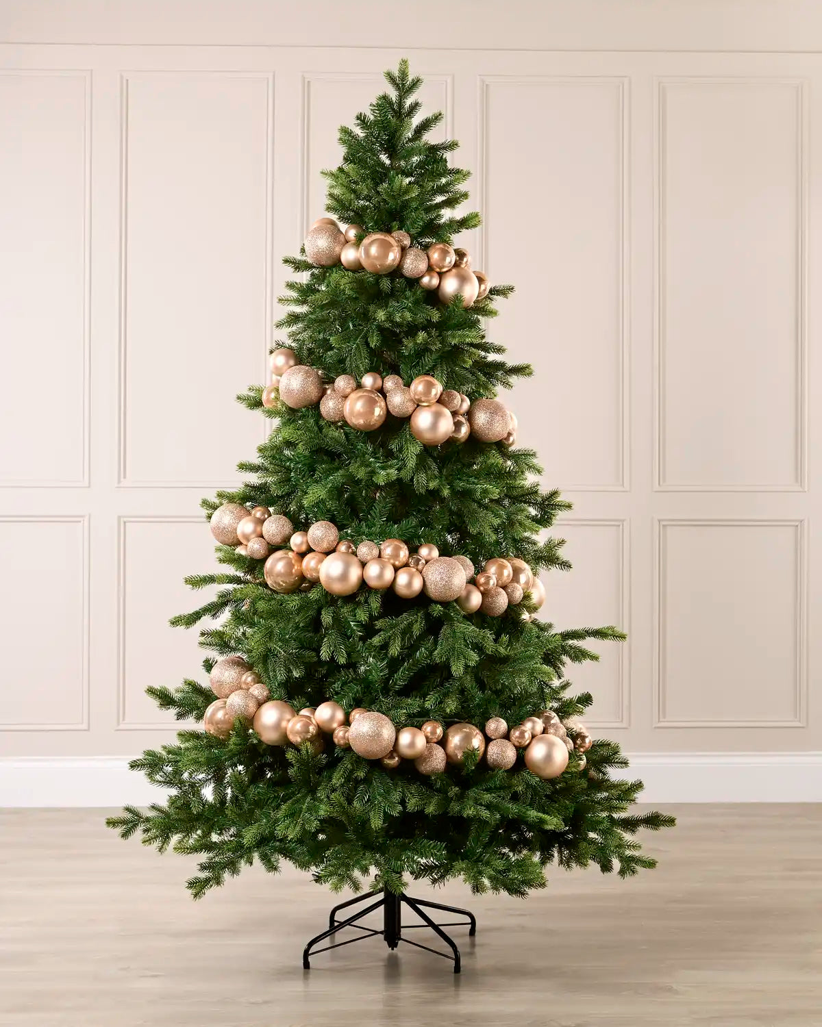 Rose Gold Bauble Garland decorating a Christmas tree