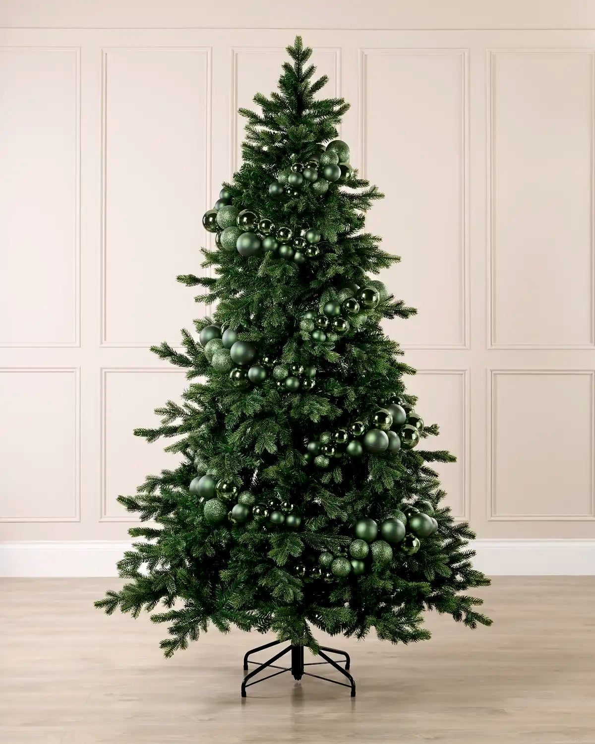 Sage Green Bauble Cluster Arch decorating a Christmas tree, with glossy, matte, and glitter sage green baubles