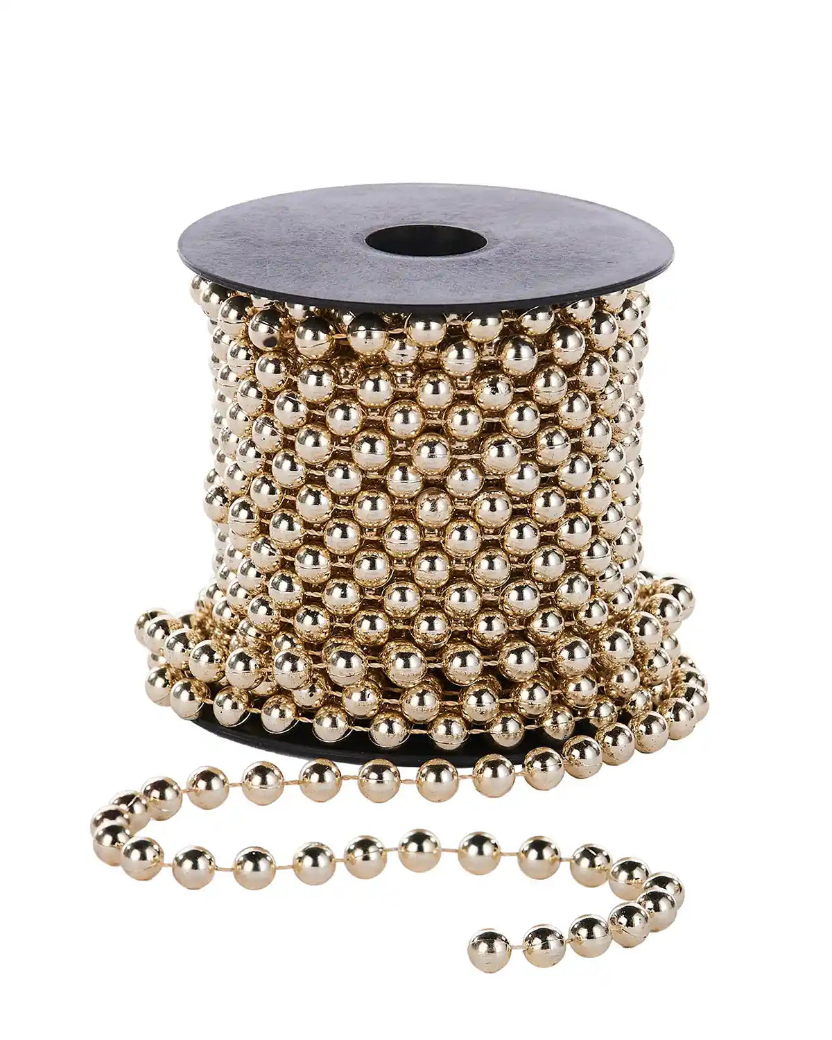 Spool of Gold beaded garland on a white background