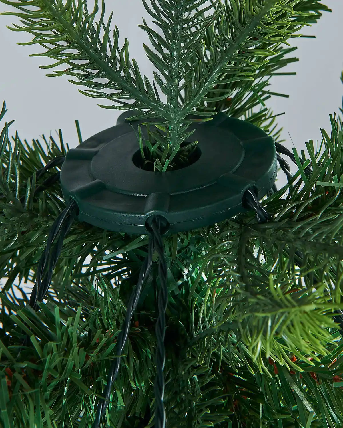 Close up of the central top ring for the 240 LED Christmas Tree Light String, Multi Colour, 2.5 m on a Christmas Tree