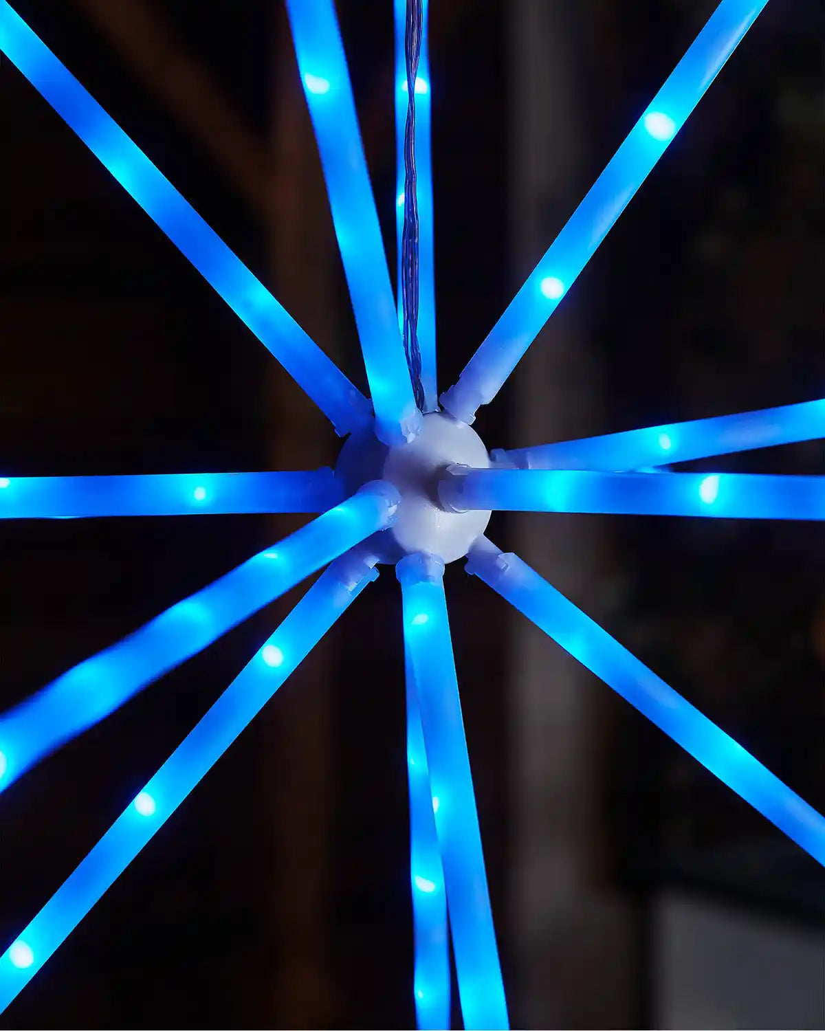 Blue LED light wheel on a dark background