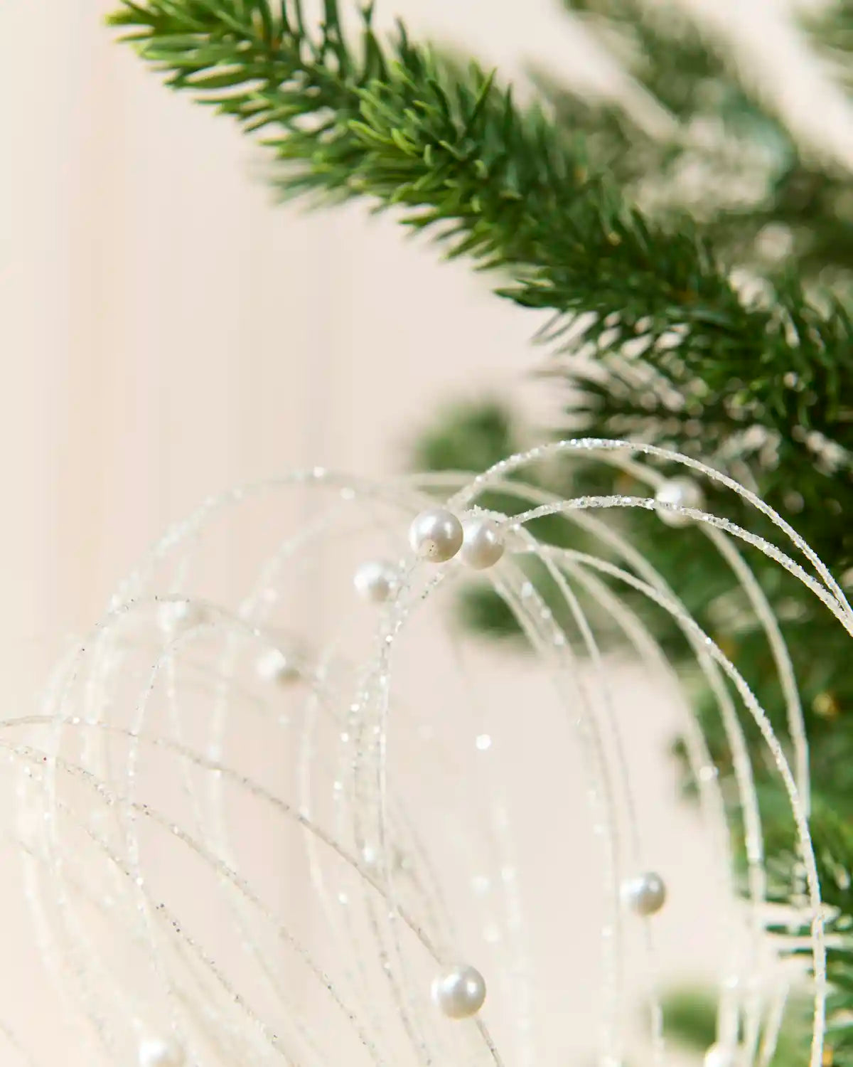 White Glitter Nest Christmas Tree Pick highlighting the glitter details and White balls
