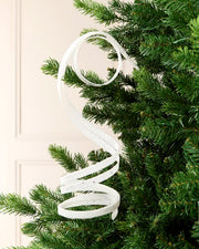 White Glitter Spiral Swirl Pick hanging from Christmas tree branch with cream background
