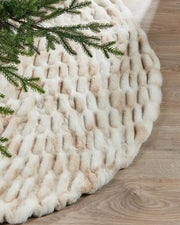 White and Beige Christmas tree skirt on a wooden floor under a Christmas tree