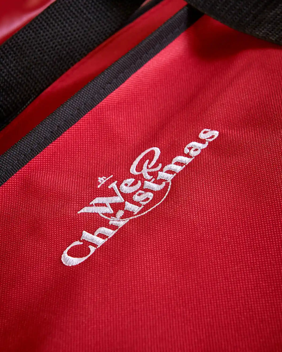 Close up of the White WeRChristmas logo on the Red Wrapping Paper Storage Bag 83cm  