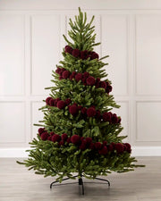 Burgundy velvet bauble garland wrapped around a green Christmas tree with mixed 5cm, 7cm and 10cm baubles.