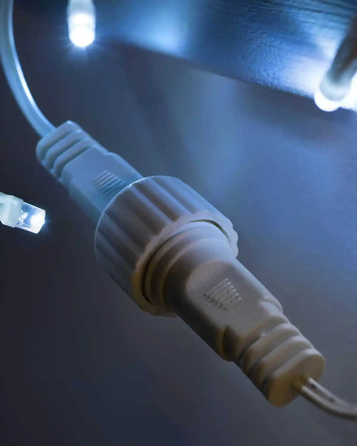Close-up of the waterproof connector fitting for the bright white icicle Christmas lights