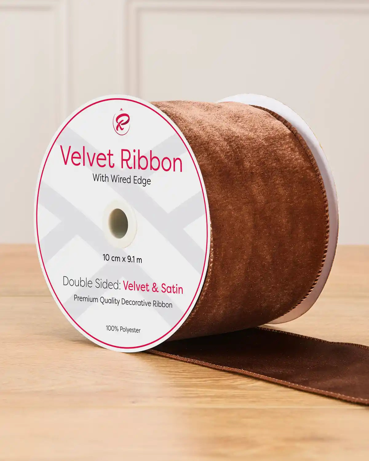 10 cm wide espresso double-sided wired velvet ribbon on a 9 m roll with product label.