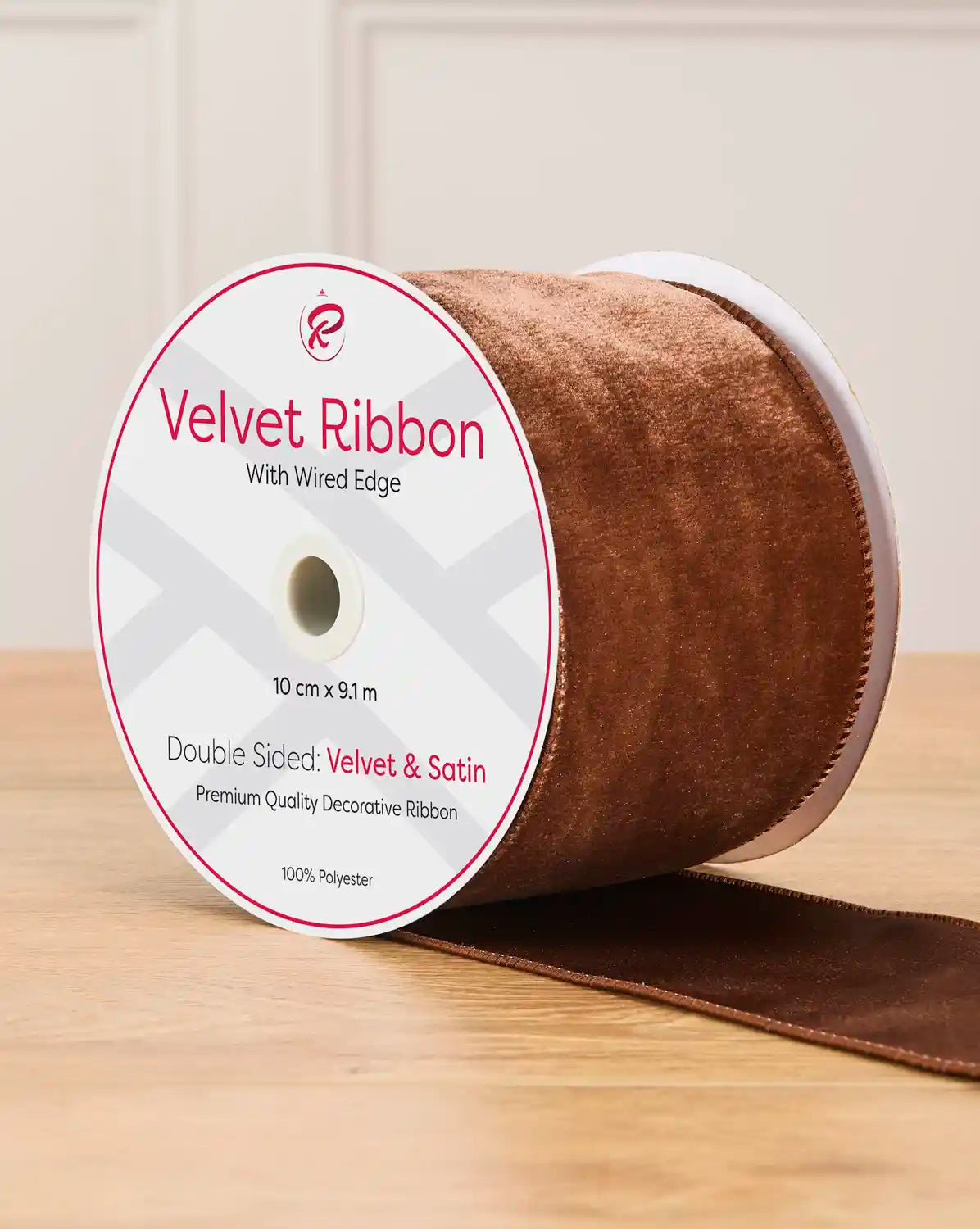 10 cm wide espresso double-sided wired velvet ribbon on a 9 m roll with product label.