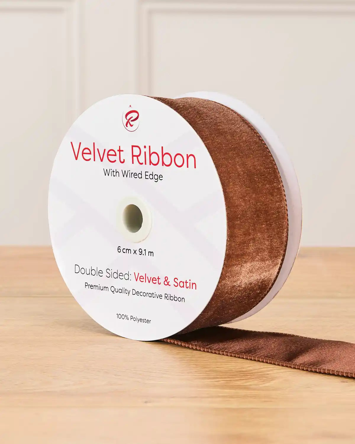 6 cm wide espresso double-sided wired velvet ribbon on a 9 m roll with product label.