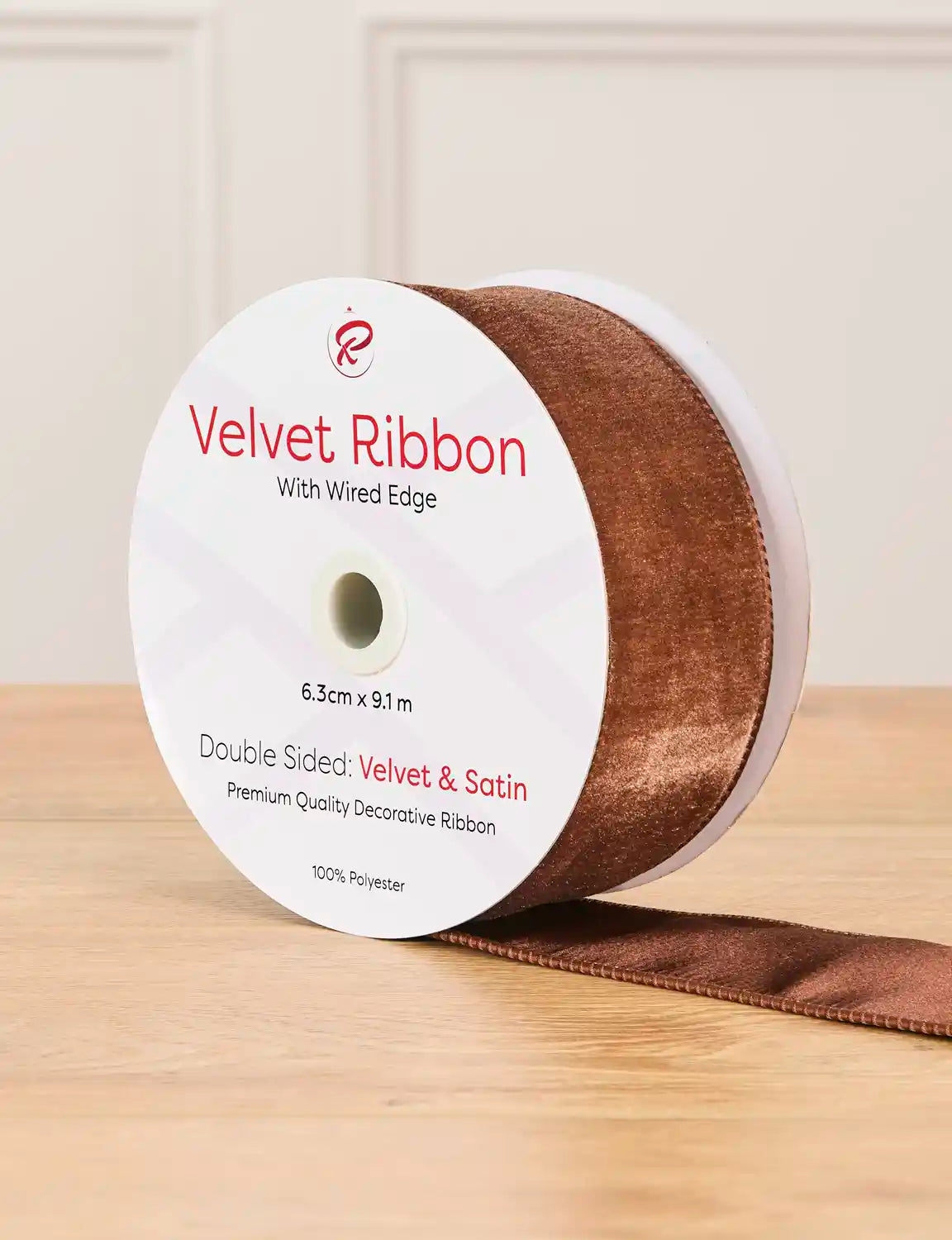 6 cm wide espresso double-sided wired velvet ribbon on a 9 m roll with product label.