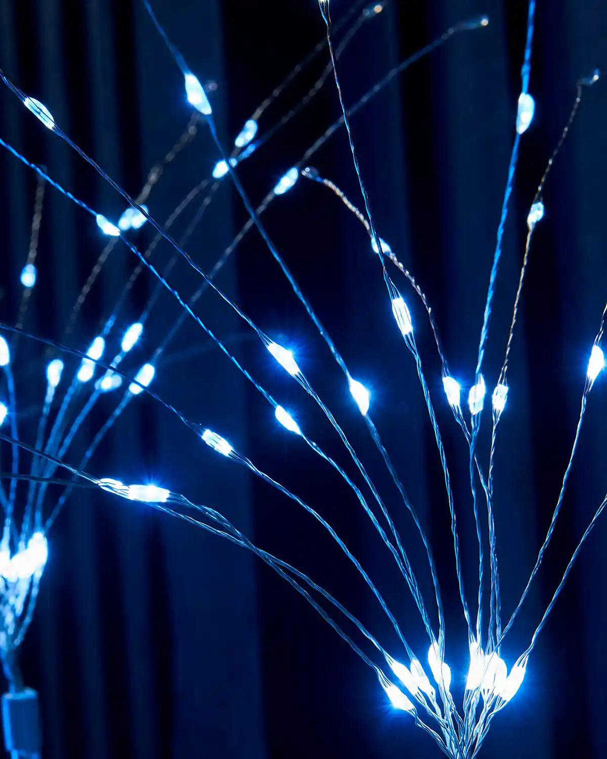 Close-up of the illuminated stem on the firework pathway stake lights