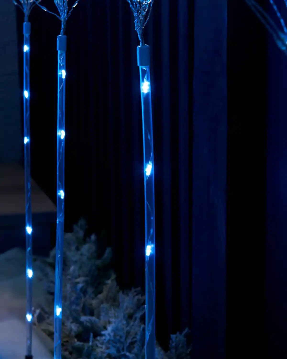Close-up of the bright white LEDs on the firework stake light branches