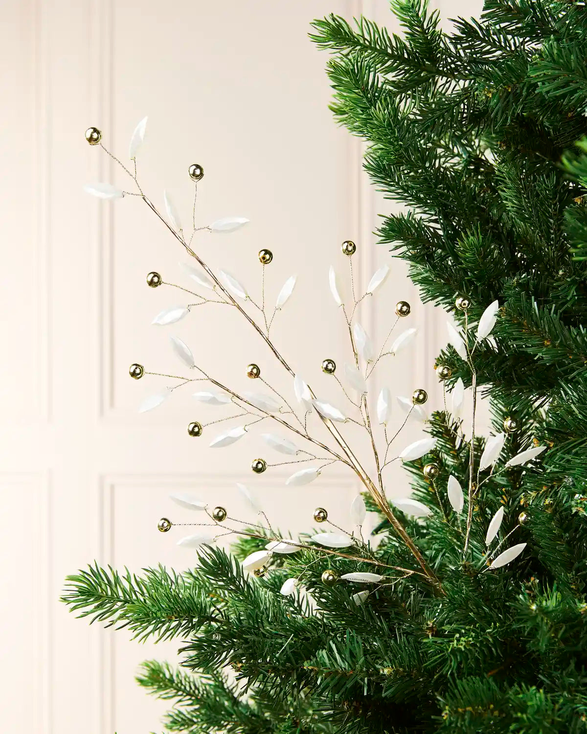 81 cm Christmas tree pick with white pearl leaves and gold beads arranged among green branches.