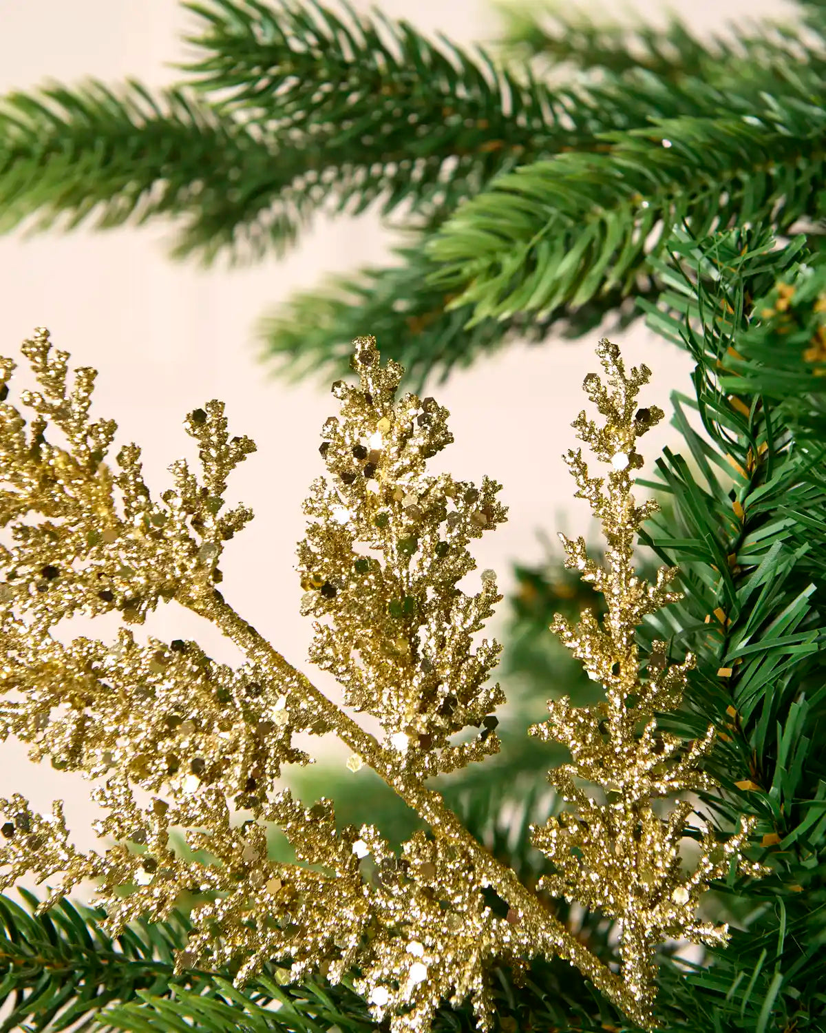 Gold glitter leaf pick showing branched foliage with sparkling glitter and sequin detailing.