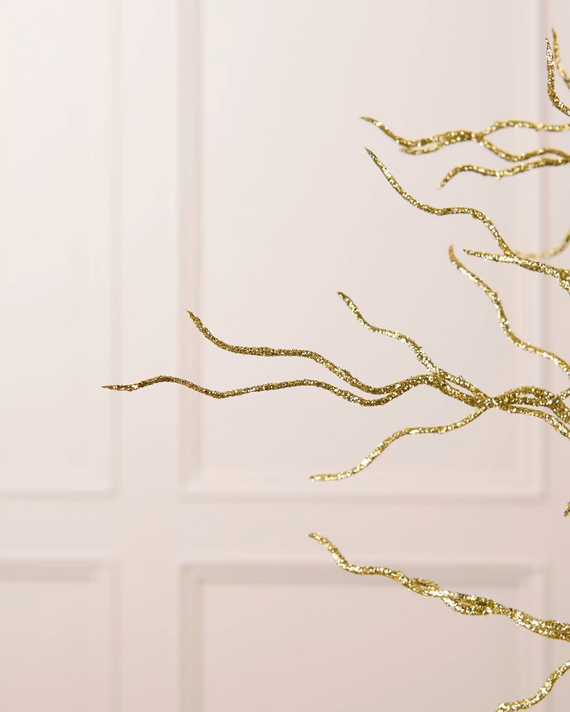 Close-up of the fine branching structure and gold glitter finish on the 90 cm twig tree topper.