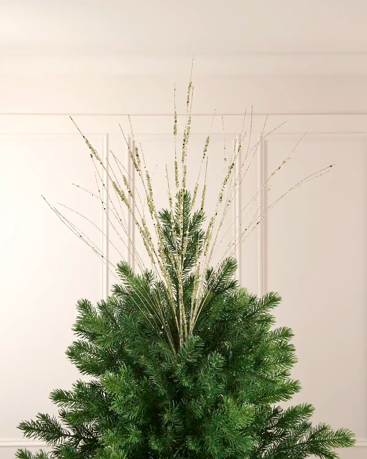 Gold glitter wispy spray displayed as a tall 100 cm Christmas tree topper with radiating sparkling strands.