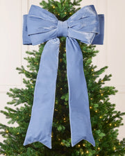 Large 140 cm ice blue velvet Christmas bow displayed on a decorated Christmas tree.