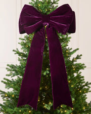 Large 140 cm purple velvet Christmas bow displayed on a decorated Christmas tree.
