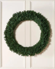 1 m majestic Christmas wreath displayed on a white panelled door