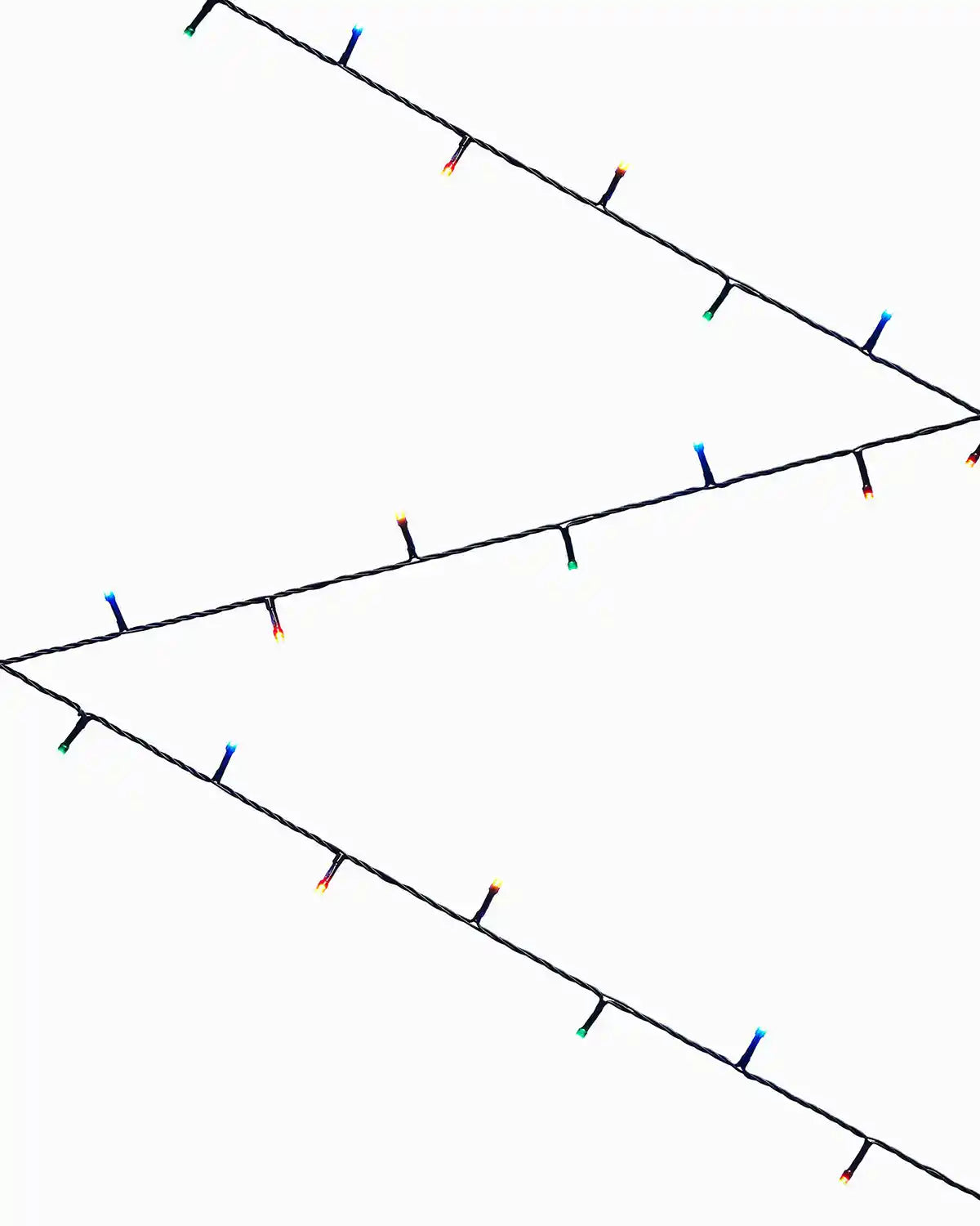 multi colour string lights on a white background in a zig zag pattern