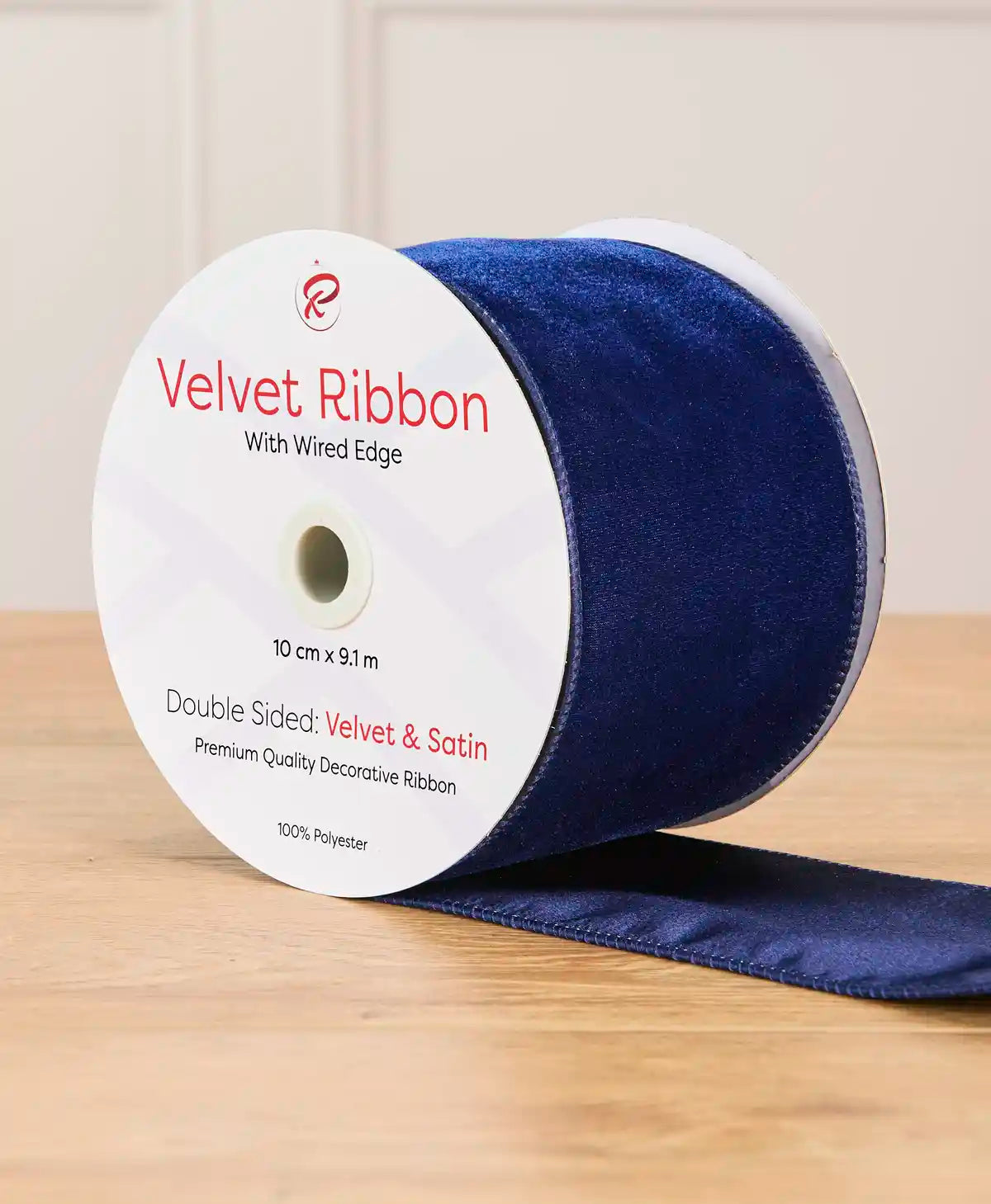 Roll of navy 10 cm double-sided wired velvet ribbon with satin reverse, measuring 9 m.