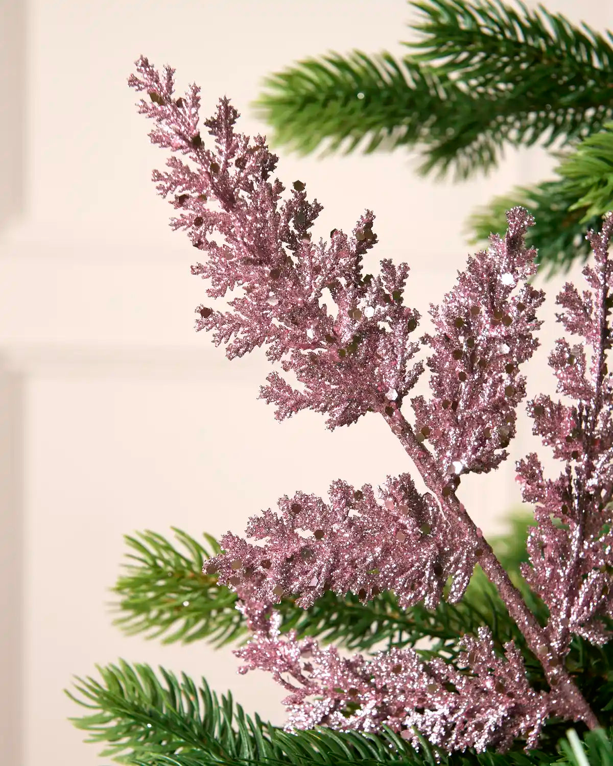 Pink glitter leaf pick showing its detailed branching foliage and reflective sequin finish.