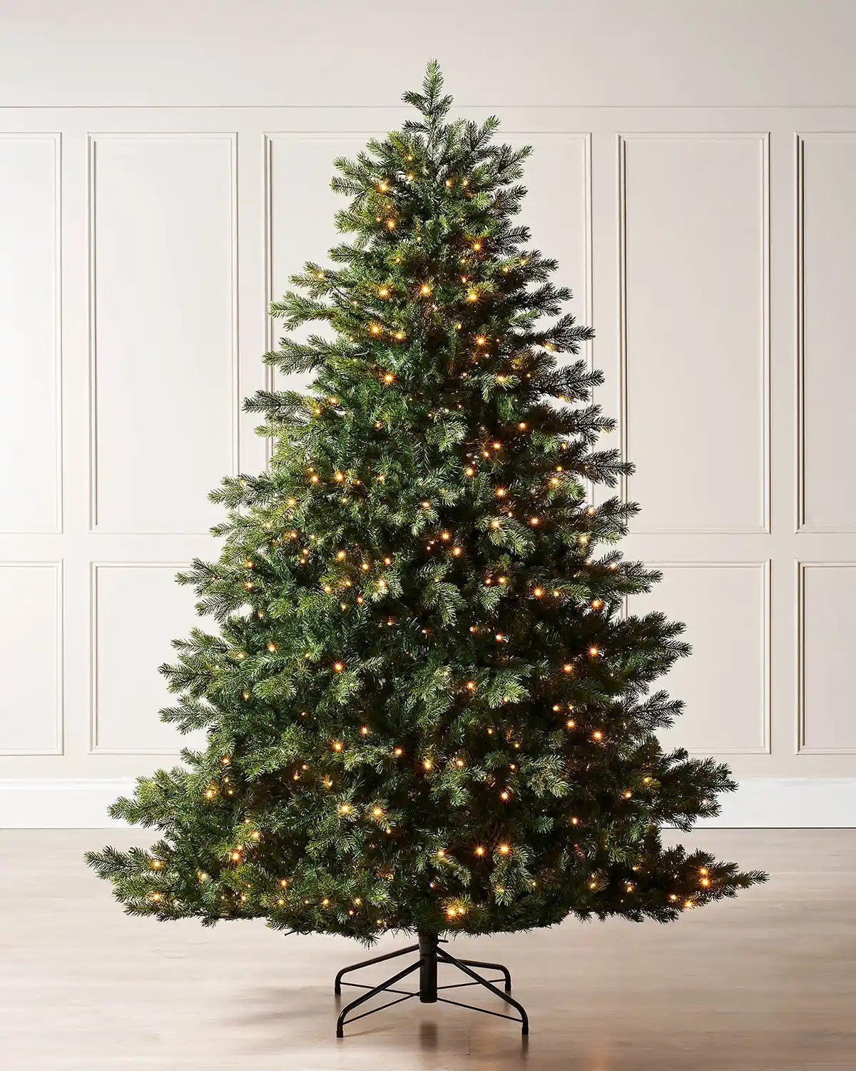 6 ft pre-lit Balsam Fir Christmas tree with warm white lights in a room setting