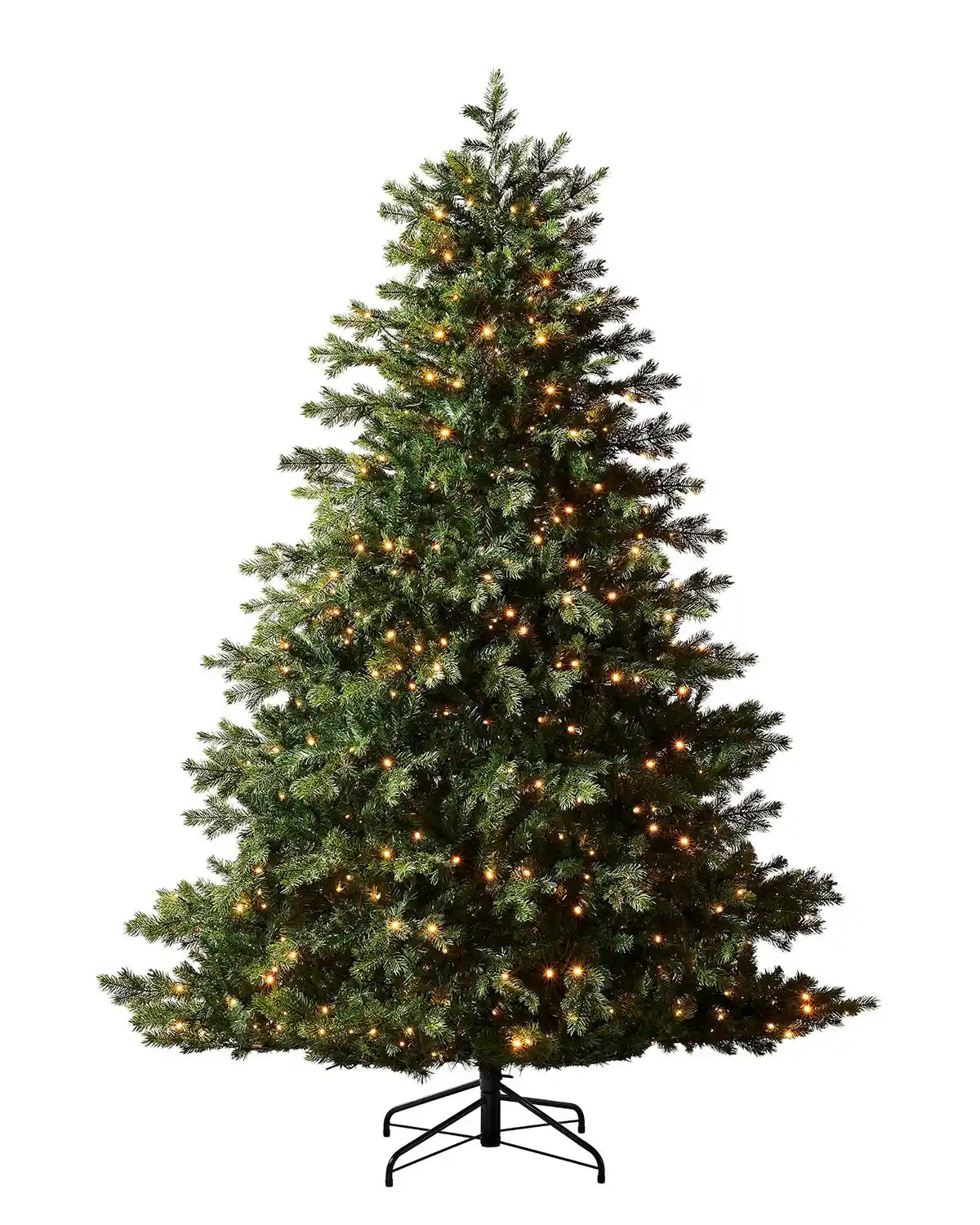 6 ft pre-lit Balsam Fir Christmas tree with warm white lights and black metal stand on a white background