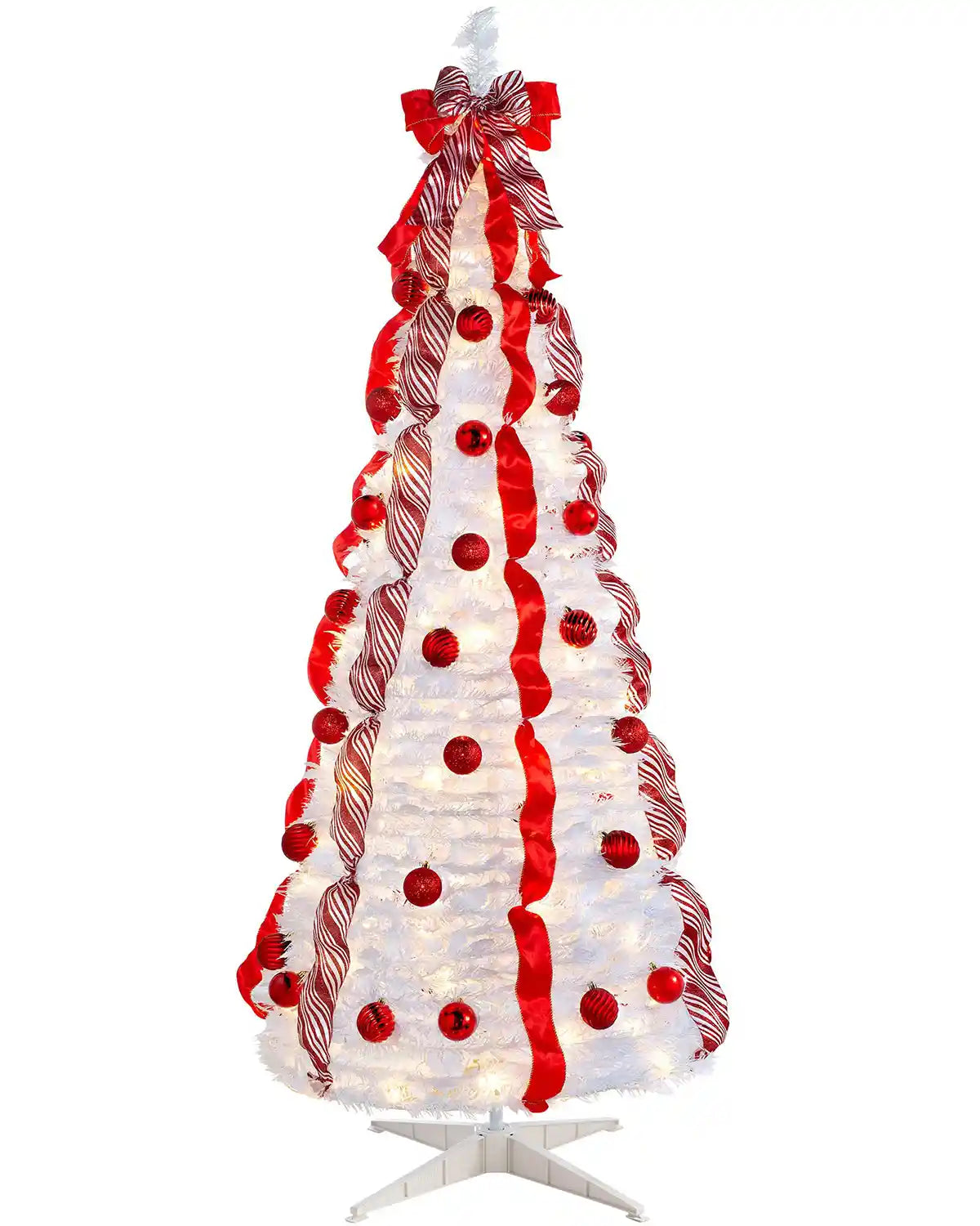 Pre-lit pop-up decorated Christmas tree in red and white with warm white LEDs on a white background