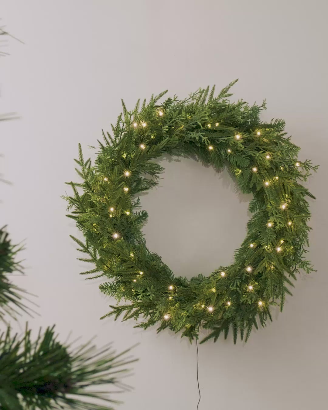 Load video: Pre-Lit Natural Fir Wreath, 76 cm