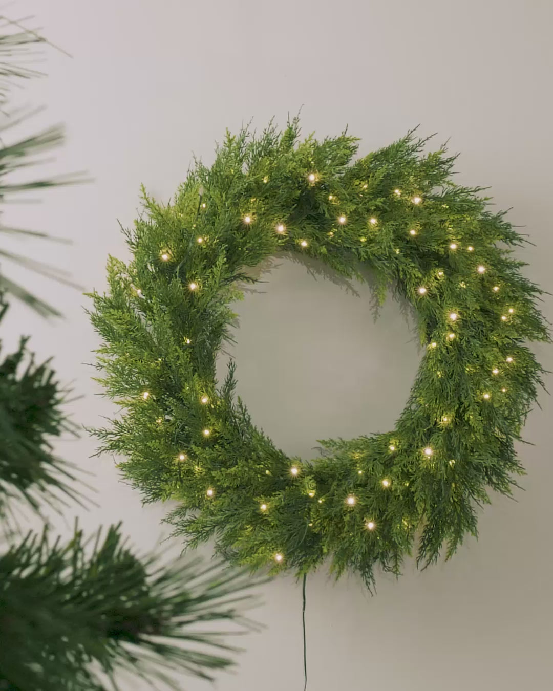 Load video: Pre-Lit Cypress Fir Wreath, 76 cm