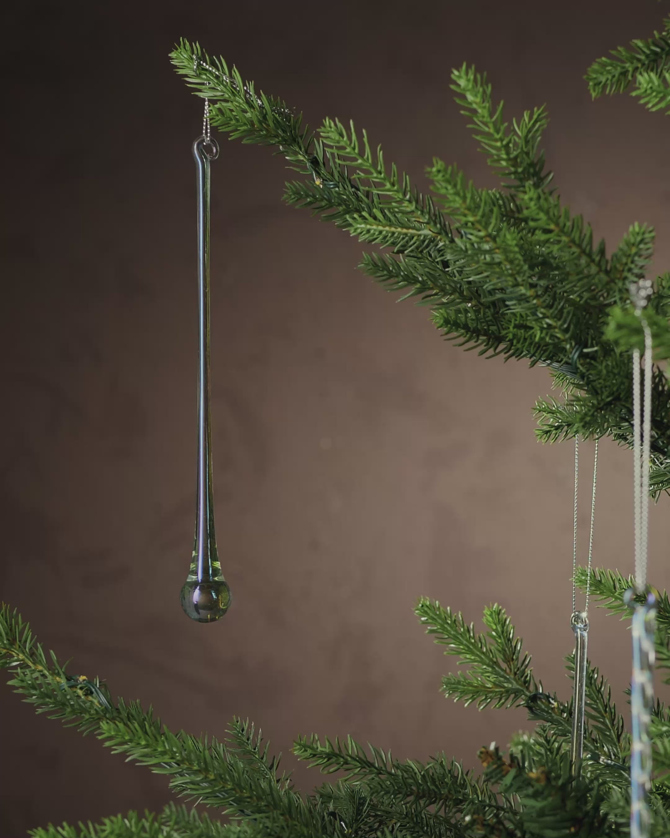 Load video: Set of 6 Iridescent Glass Teardrop Icicles, 25 cm