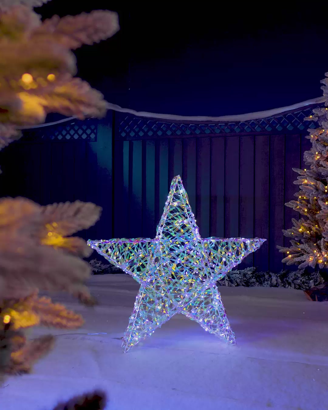 Load video: Pre-Lit 3D Iridescent Star Silhouette, 81 cm