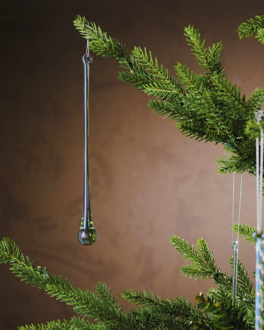Load video: Set of 6 Iridescent Glass Teardrop Icicles, 25 cm