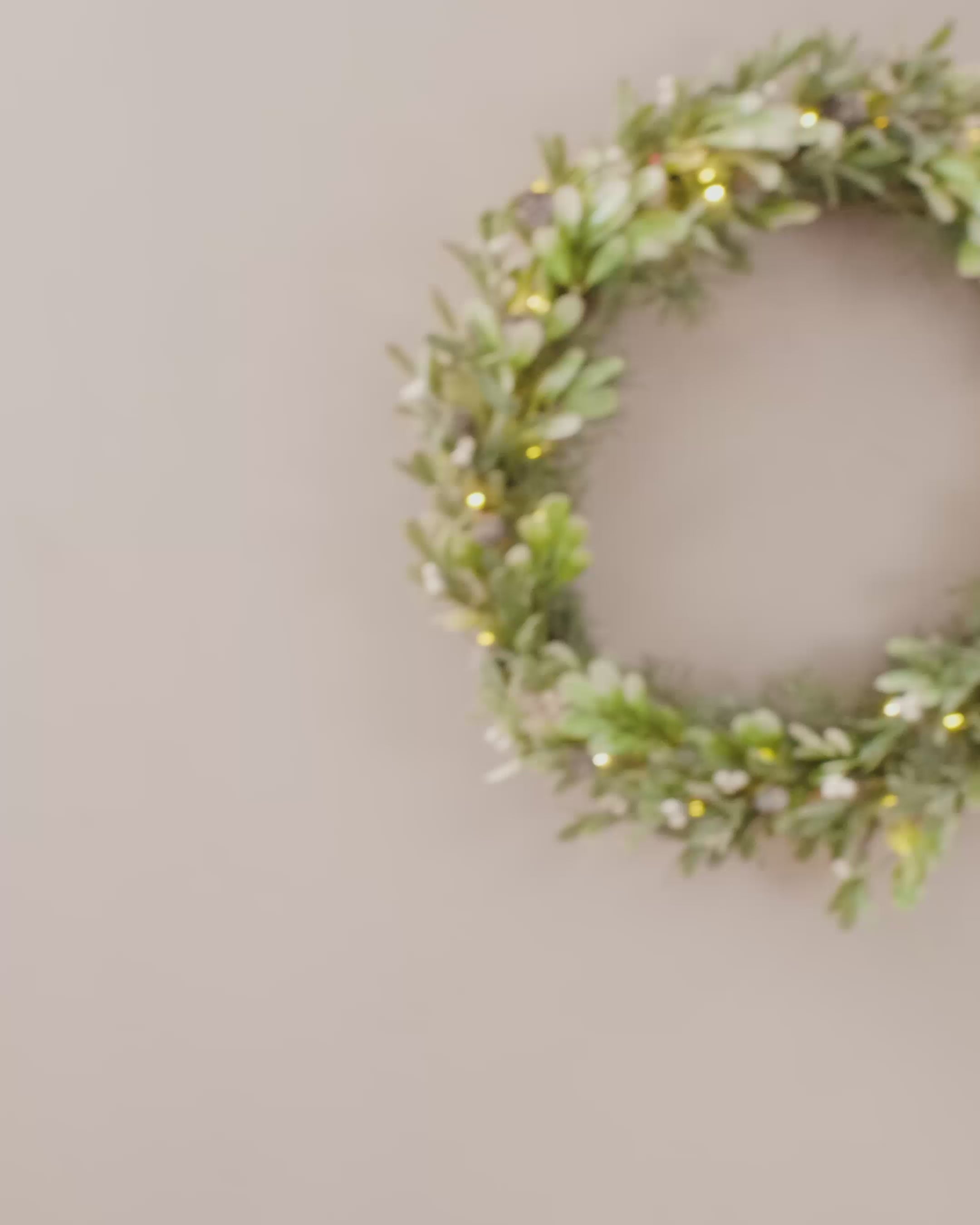 Load video: Pre-Lit Frosted Mistletoe Wreath with Pinecones &amp; Berries, 76 cm