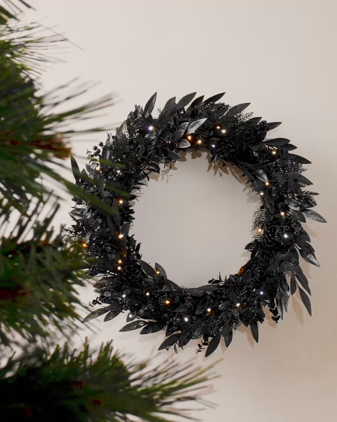 Load video: Pre-Lit Mixed Pine Black Wreath, 76 cm