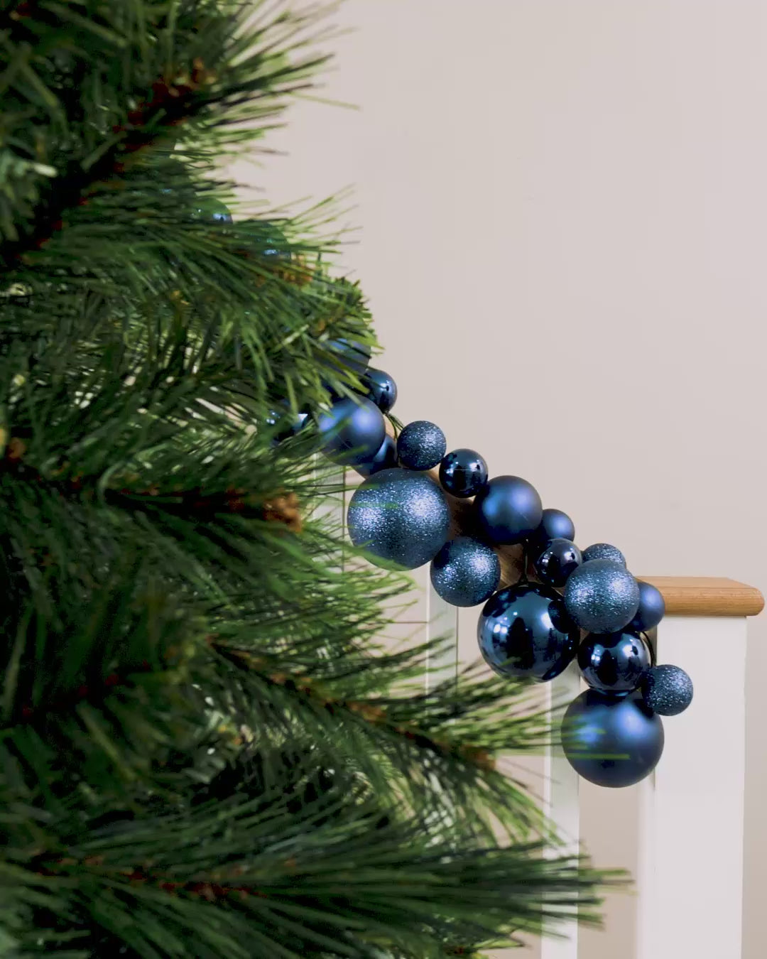 Load video: Navy Blue Bauble Garland, 9 ft