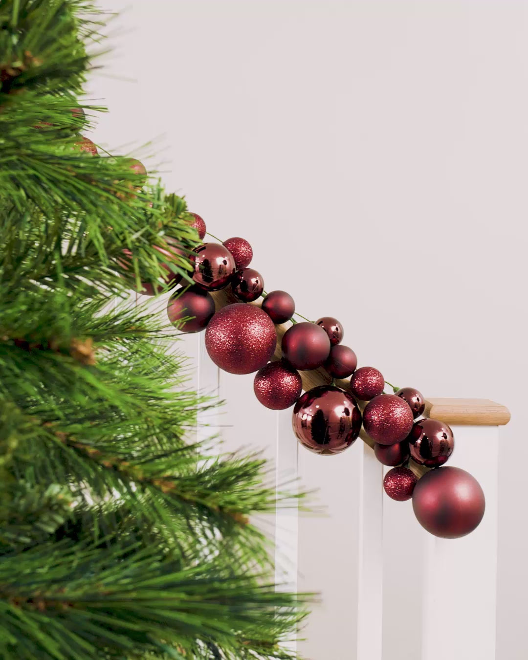 Load video: Burgundy Bauble Garland, 9 ft
