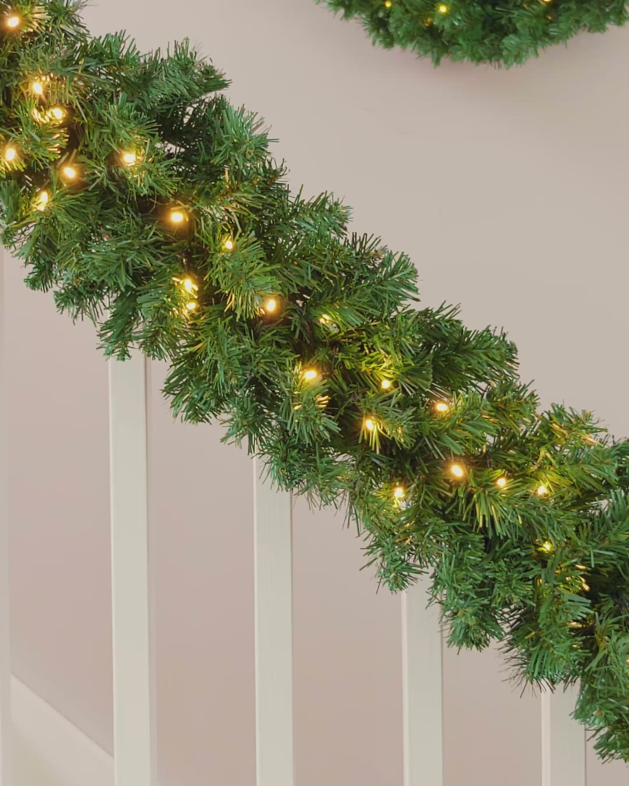 Load video: Pre-Lit Extra Thick Pine Garland, 9 ft