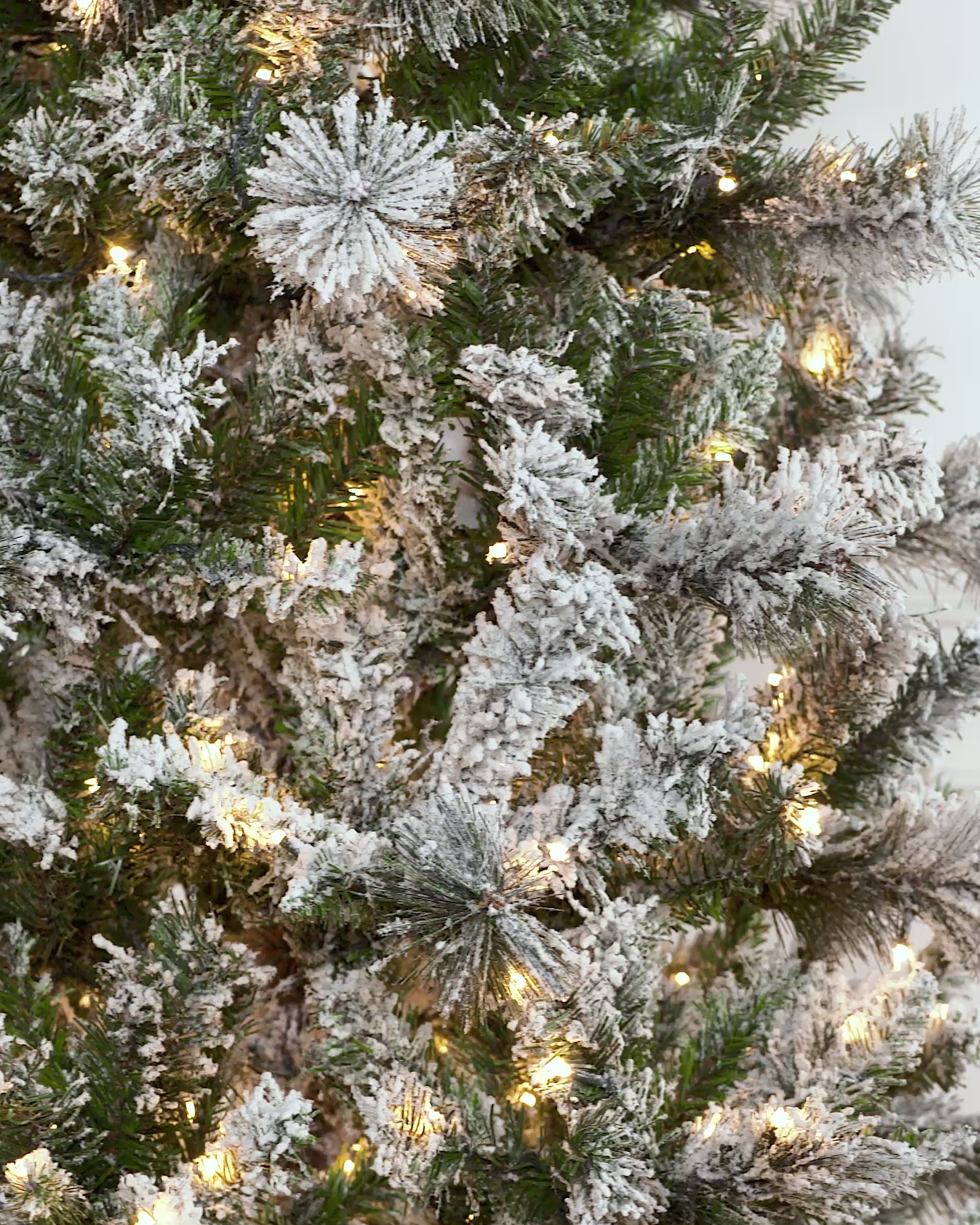 Load video: Pre-Lit Slim Snow Flocked Christmas Tree, 6 ft