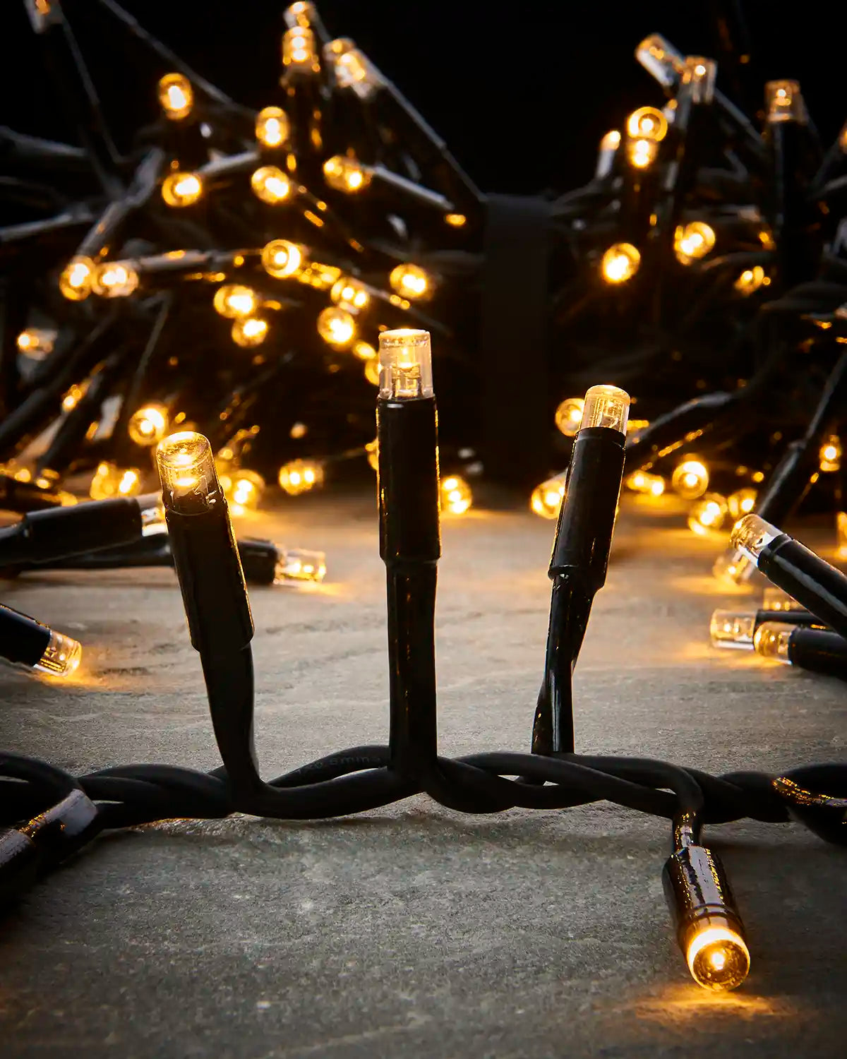 Close-up of warm white LEDs on black cable for Pro Series cluster lights.