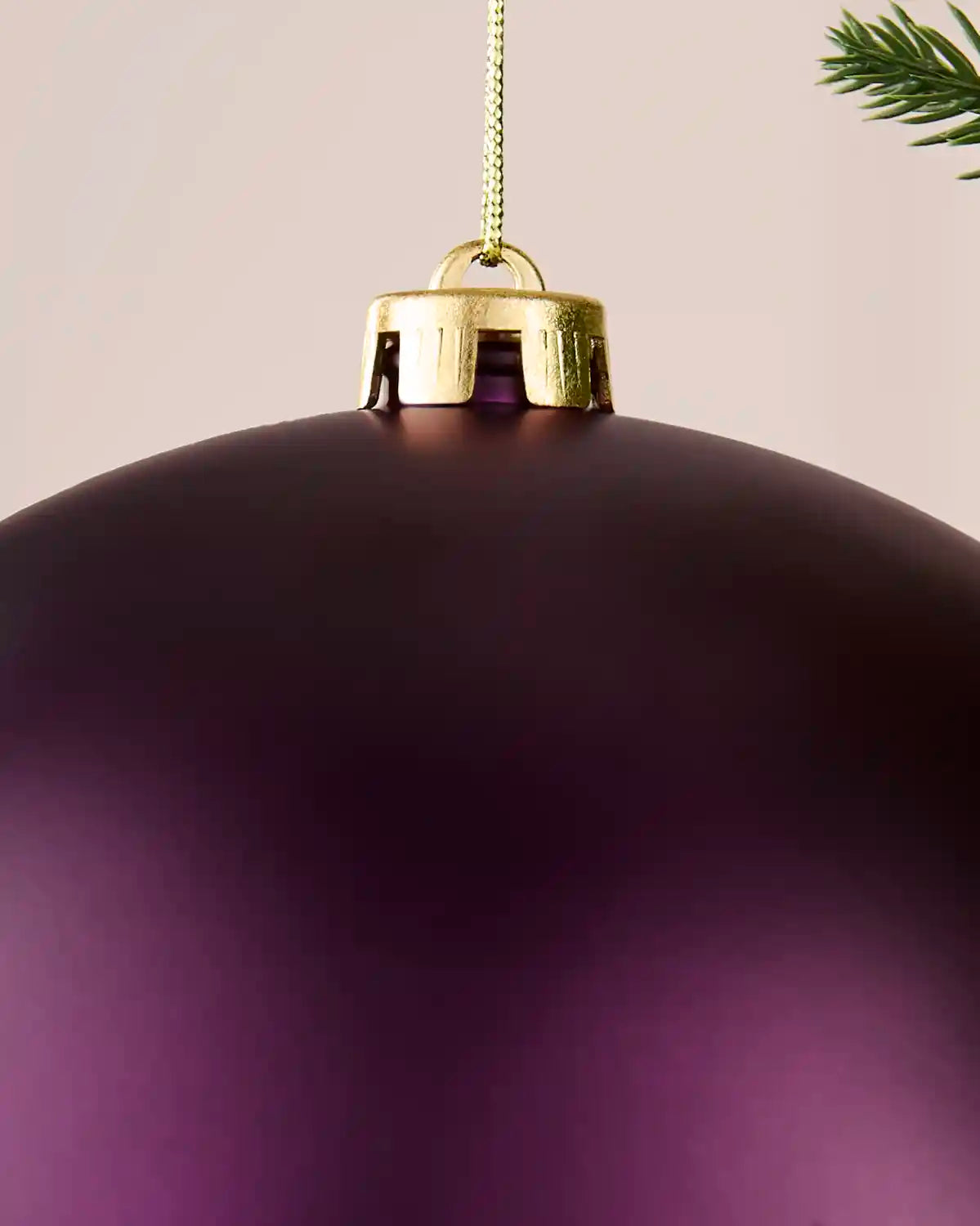 Detailed close-up of the 20 cm purple matt shatterproof bauble showing the gold cap, hanging string and smooth finish.