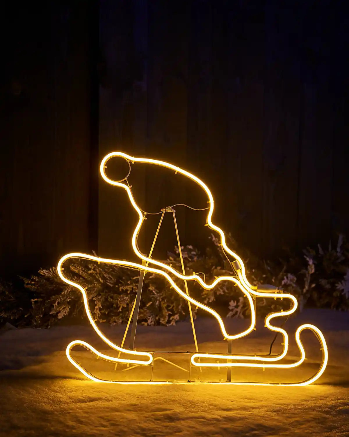 Close-up of the Santa sleigh section on the warm white neon rope light display