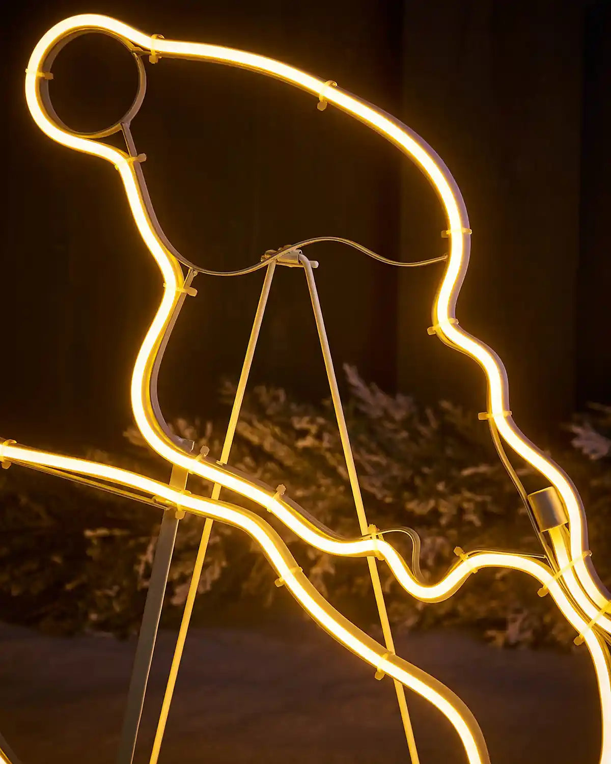 Close-up of the Santa sleigh neon rope light and metal frame detail