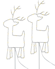 Set of two warm white LED reindeer pathway stake lights on white background