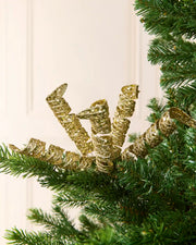 Set of three 18 cm gold glitter spiral picks arranged among green Christmas tree branches.