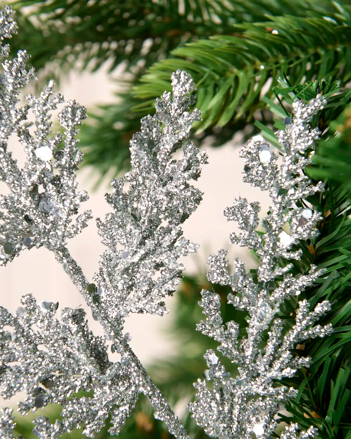 Silver glitter leaf pick showing branched foliage with sparkling glitter and sequin detailing.