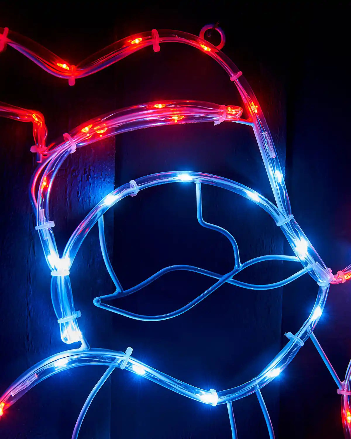 Close-up of the Santa face and hat lights on the pre-lit silhouette decoration